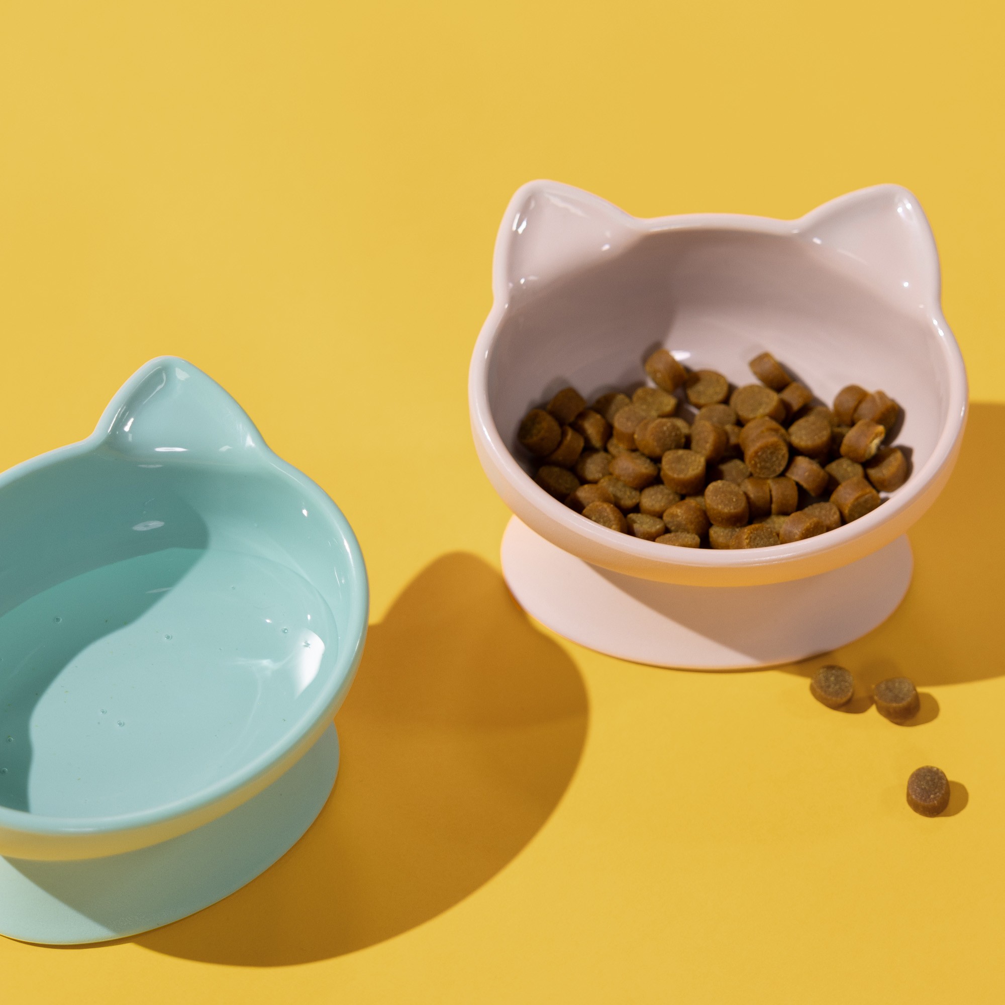 A image of a concrete sphere, balanced between two other larger spheres